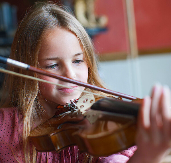 Child playing the violin